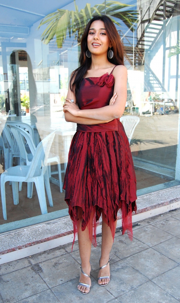 Amrita Rao in red dress.