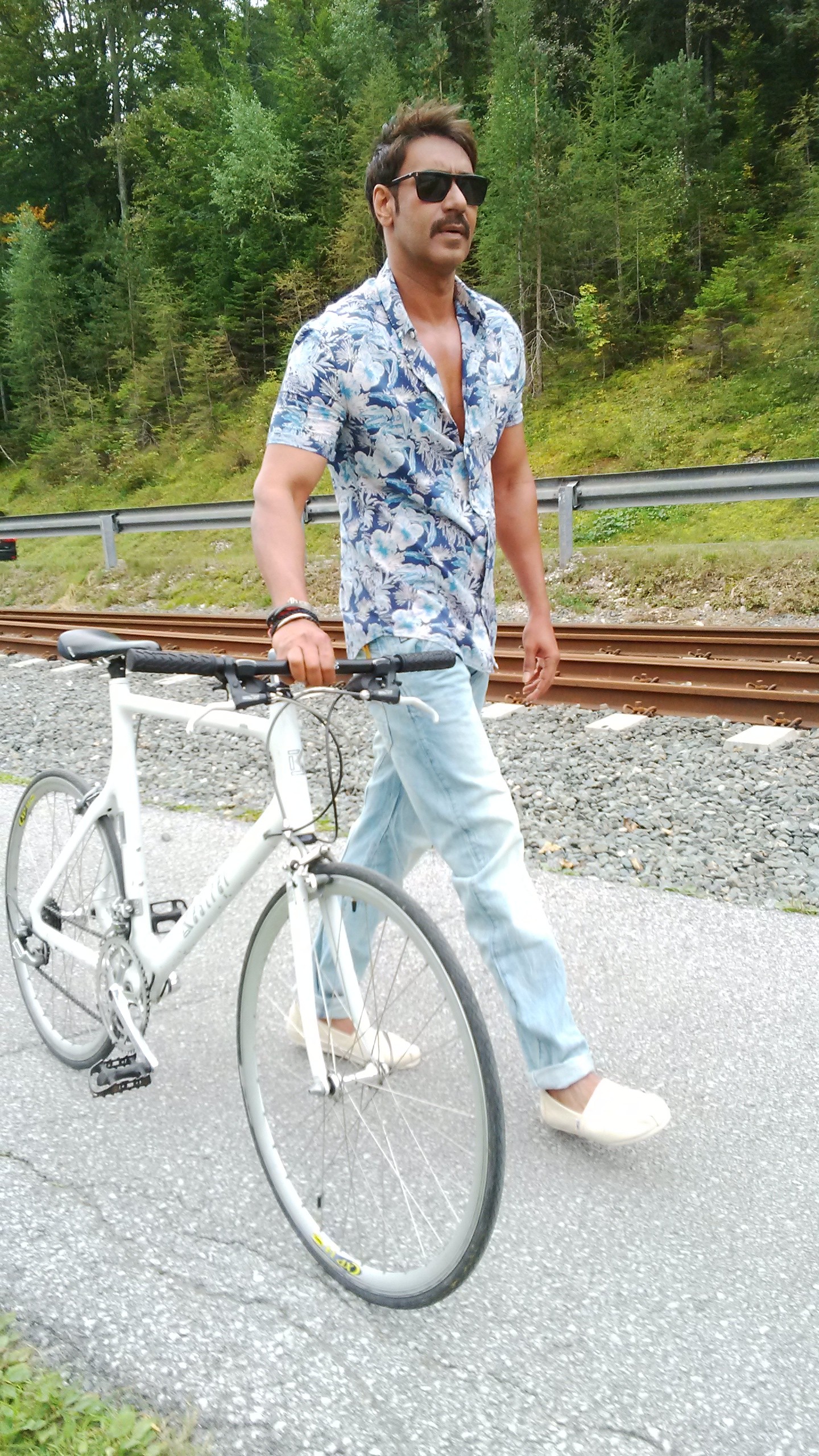Ajay Devgn riding bicycle