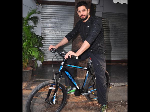 Sidharth Malhotra riding bicycle
