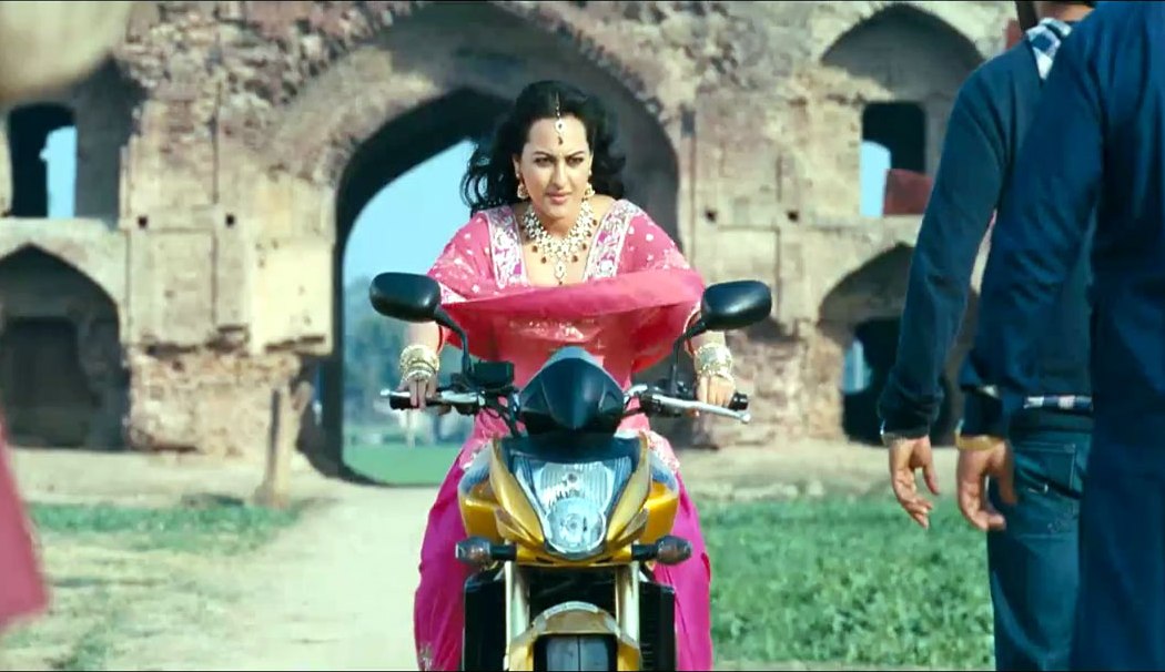 Sonakshi Sinha riding bike
