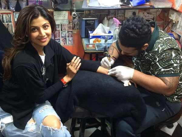Shilpa Shetty getting tattooed