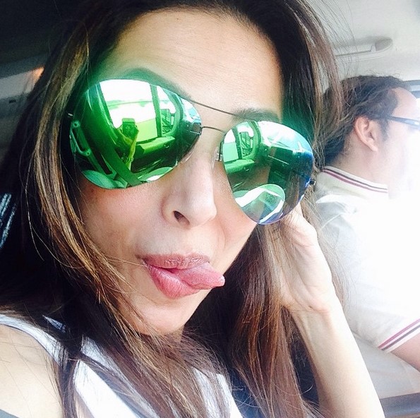 Malaika Arora Khan green sunglasses