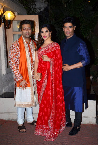 Karan Johar with Sophie Choudry and Manish Malhotra at Ekta Kapoor‘s Diwali Bash.