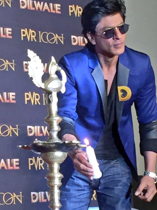 Shah Rukh Khan lighting a lamp