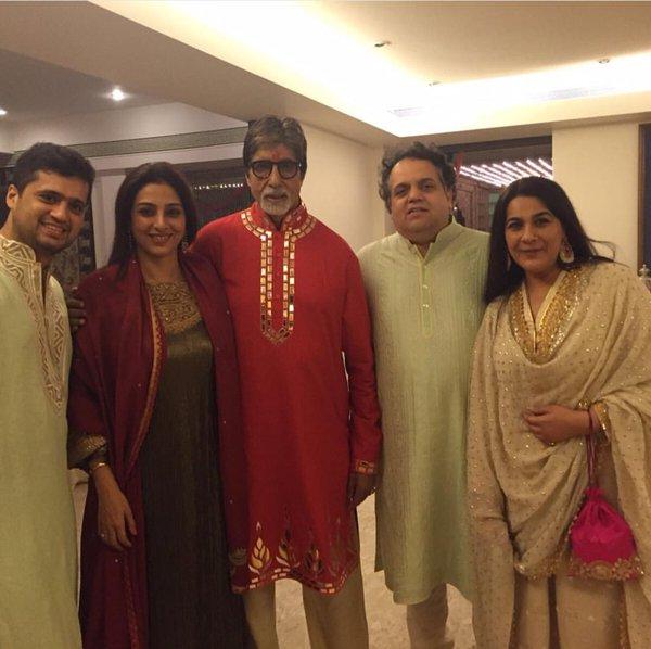 Amitabh Bachchan poses with friends on Diwali.