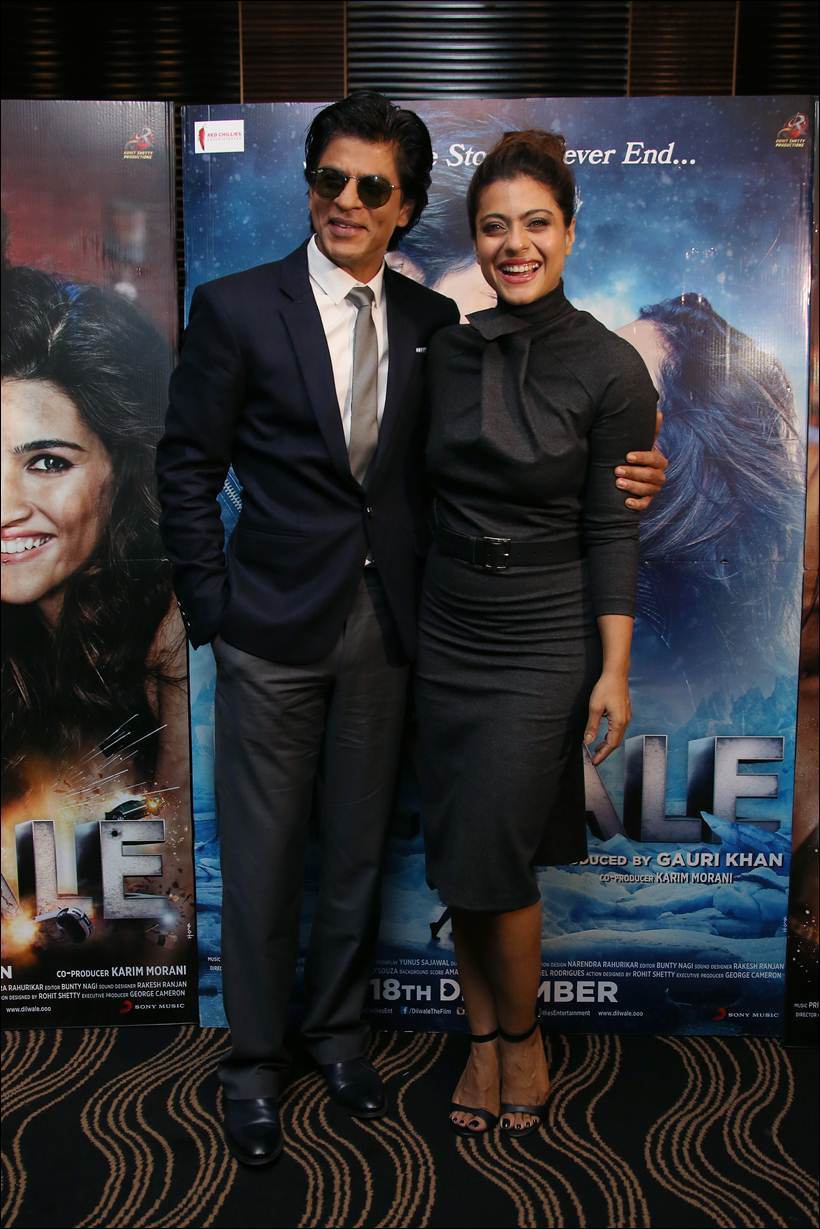 Shah Rukh Khan, Kajol smiling at the cameras