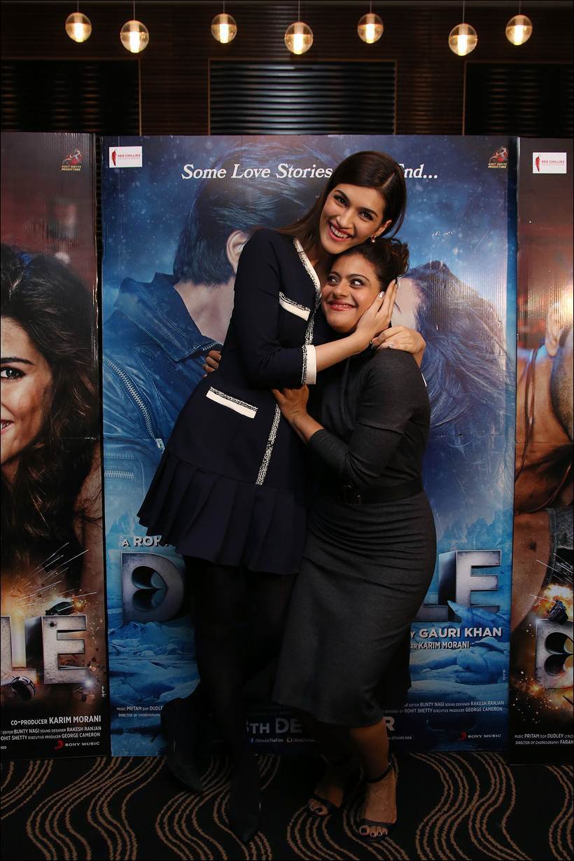 Kriti Sanon, hugging Kajol as they pose for photographers in London