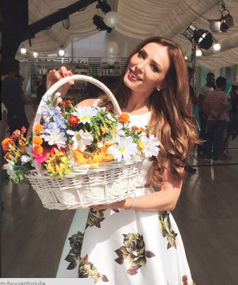 Lulia Vantur with a bouquet