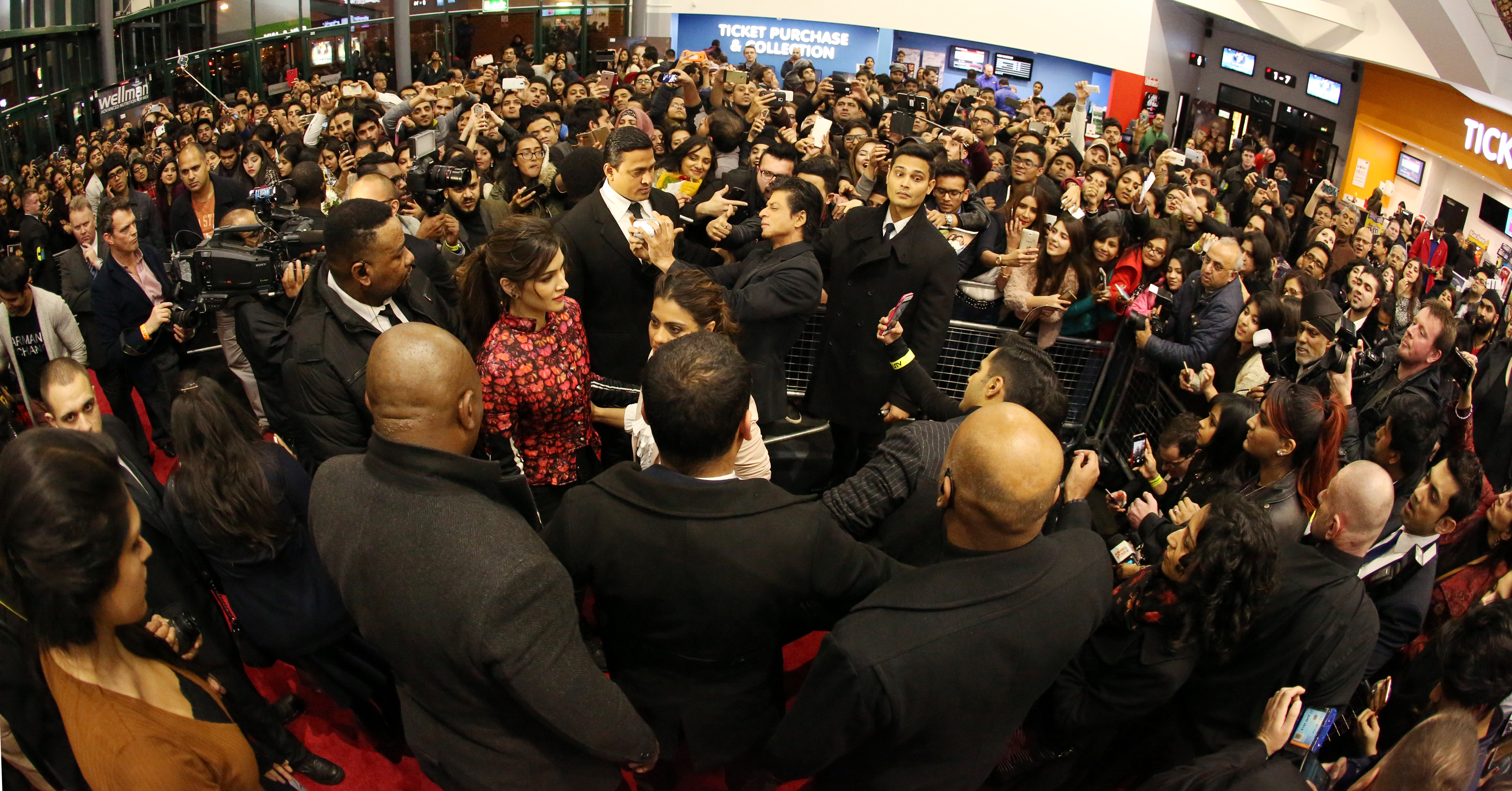 Varun Dhawan surrounded by fans