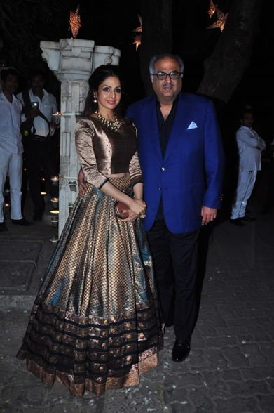 Sridevi, Boney Kapoor t in a gold cropped top and long skirt by Manish Malhotra with Boney Kapoor in blue