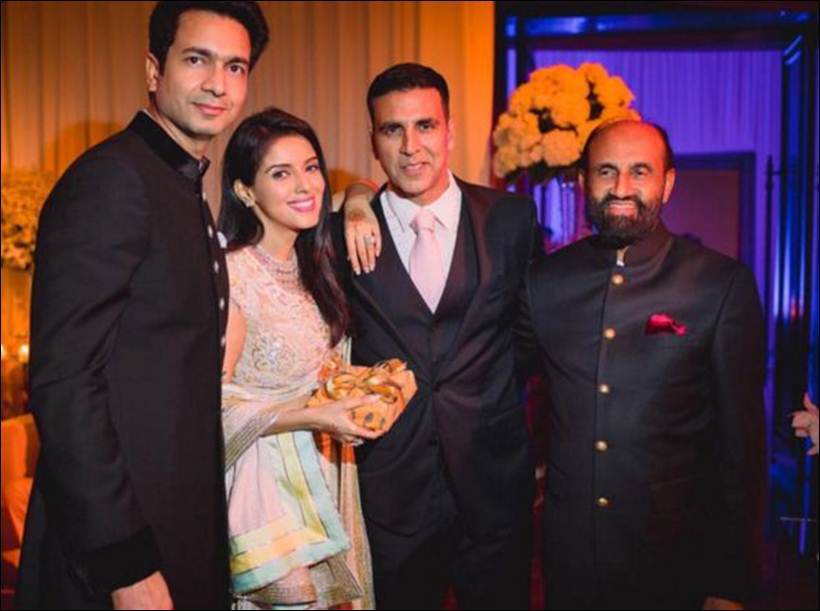 Akshay Kumar poses withe good friends ,Asin Thottukamal, Rahul Sharma at their reception