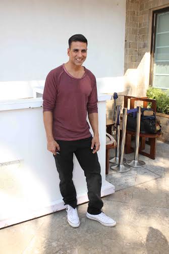 Akshay Kumar smiling in jeans and tee