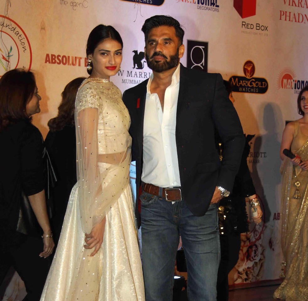 Athiya Shetty in cream traditional with father Suniel Shetty in formals