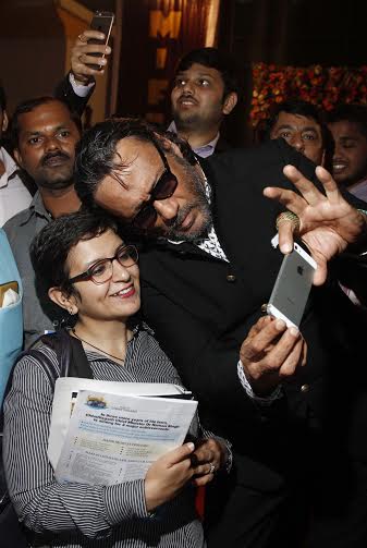 Bollywood actor and MIFF ambassador Jackie Shroff provides a selfie for a fan at Mumbai International Film Festival (MIFF) 2016