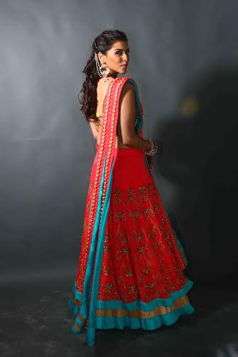 Mannara Chopra's back profile in pink and blue traditional outfit