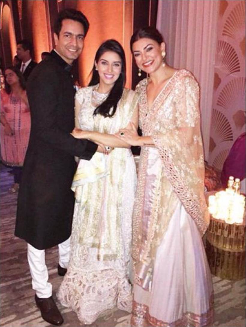 The newlyweds with Sushmita Sen.