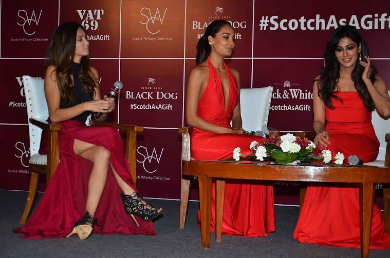 Chitrangda Singh, Lisa Haydon, Shibani Dandekar on stage at the launch of Diageo's Scotch Whiskey Gift Collection,