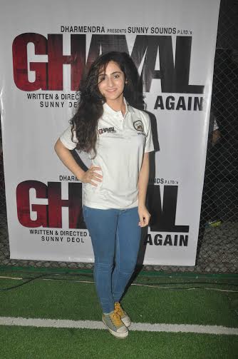 Daina Khan in white tee and jeans