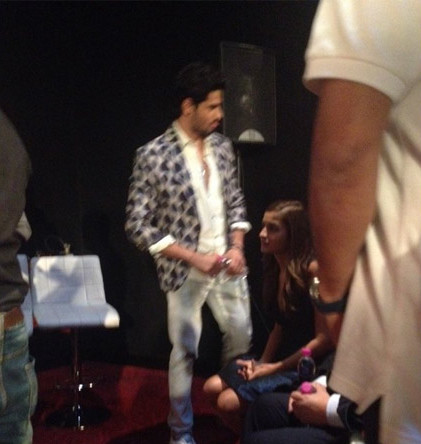 Sidharth Malhotra standing protectively beside Alia Bhatt at Kapoor & Sons Trailer Launch