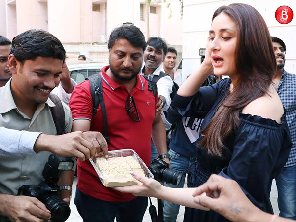 Kareena Kapoor Khan is snapped distributing sweets to media