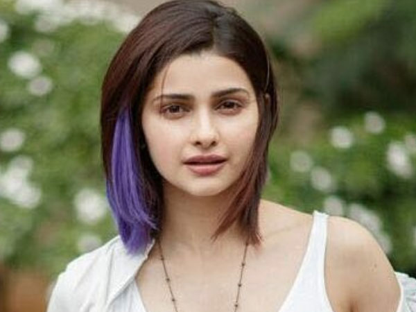 Prachi Desai adds a pop of purple to her short mane!