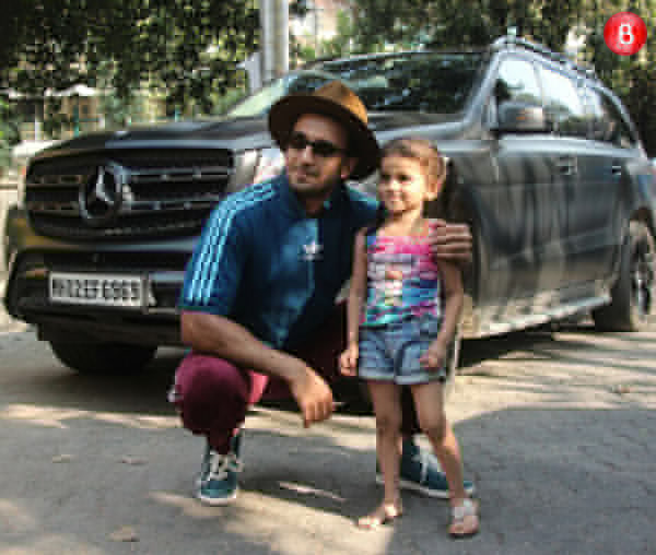 Ranveer Singh with a cute little girl