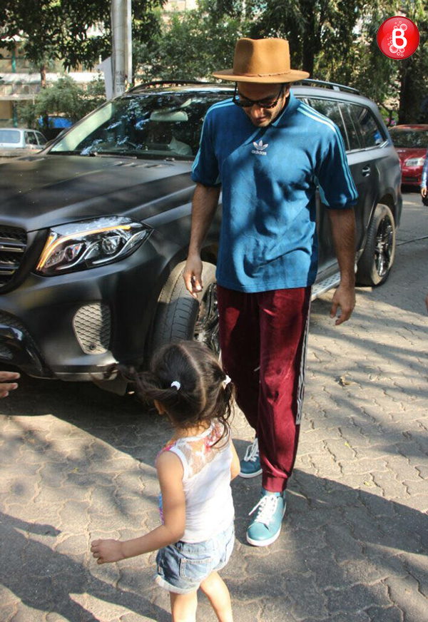 Ranveer Singh with a cute little girl