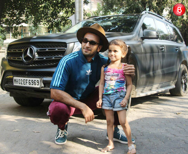 Ranveer Singh with a cute little girl