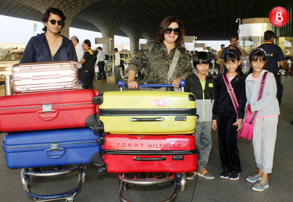 Shirish Kunder, Farah Khan are spotted along with their kids at airport