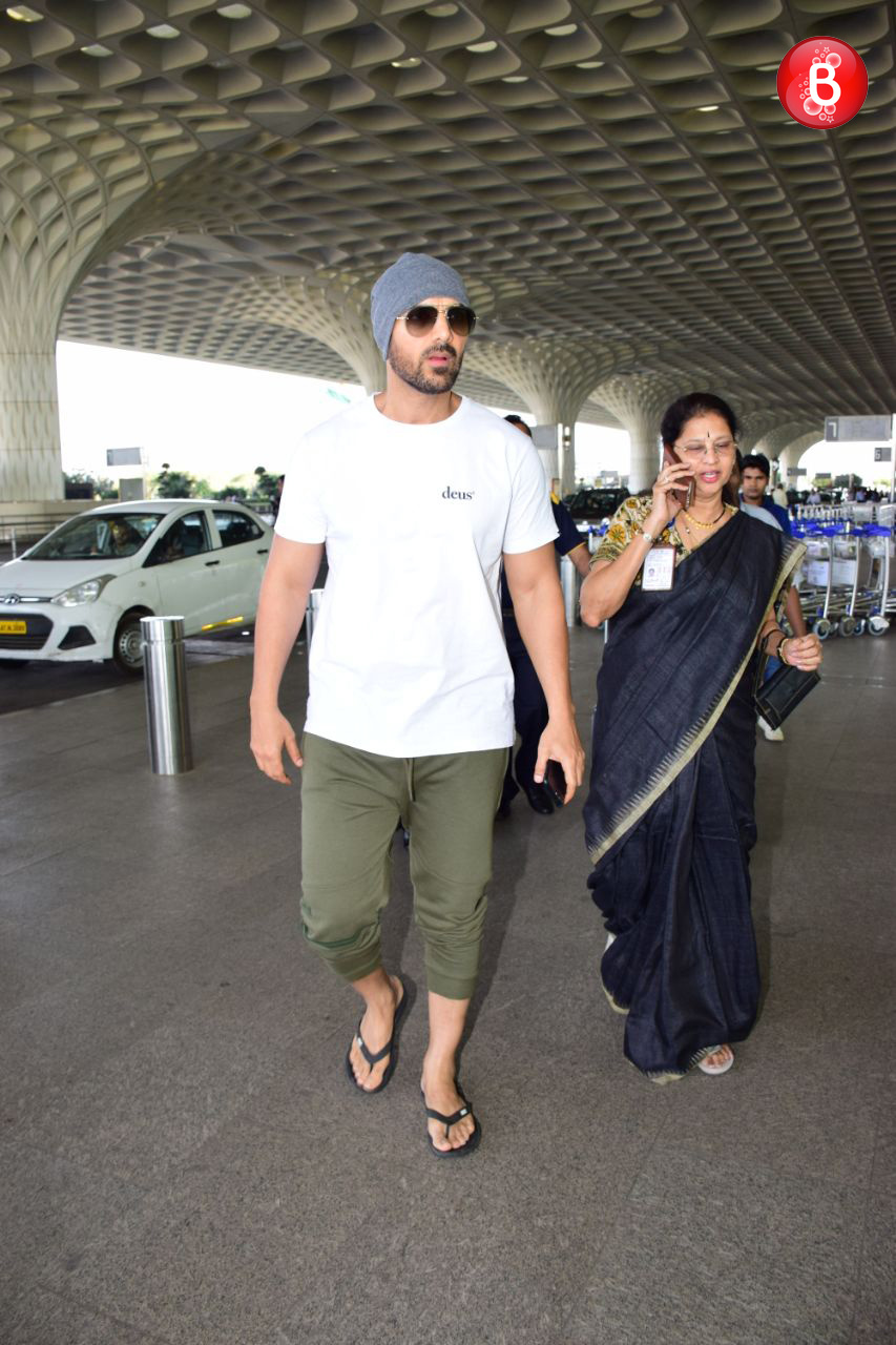 John Abraham & Priya Runchal snapped at the airport