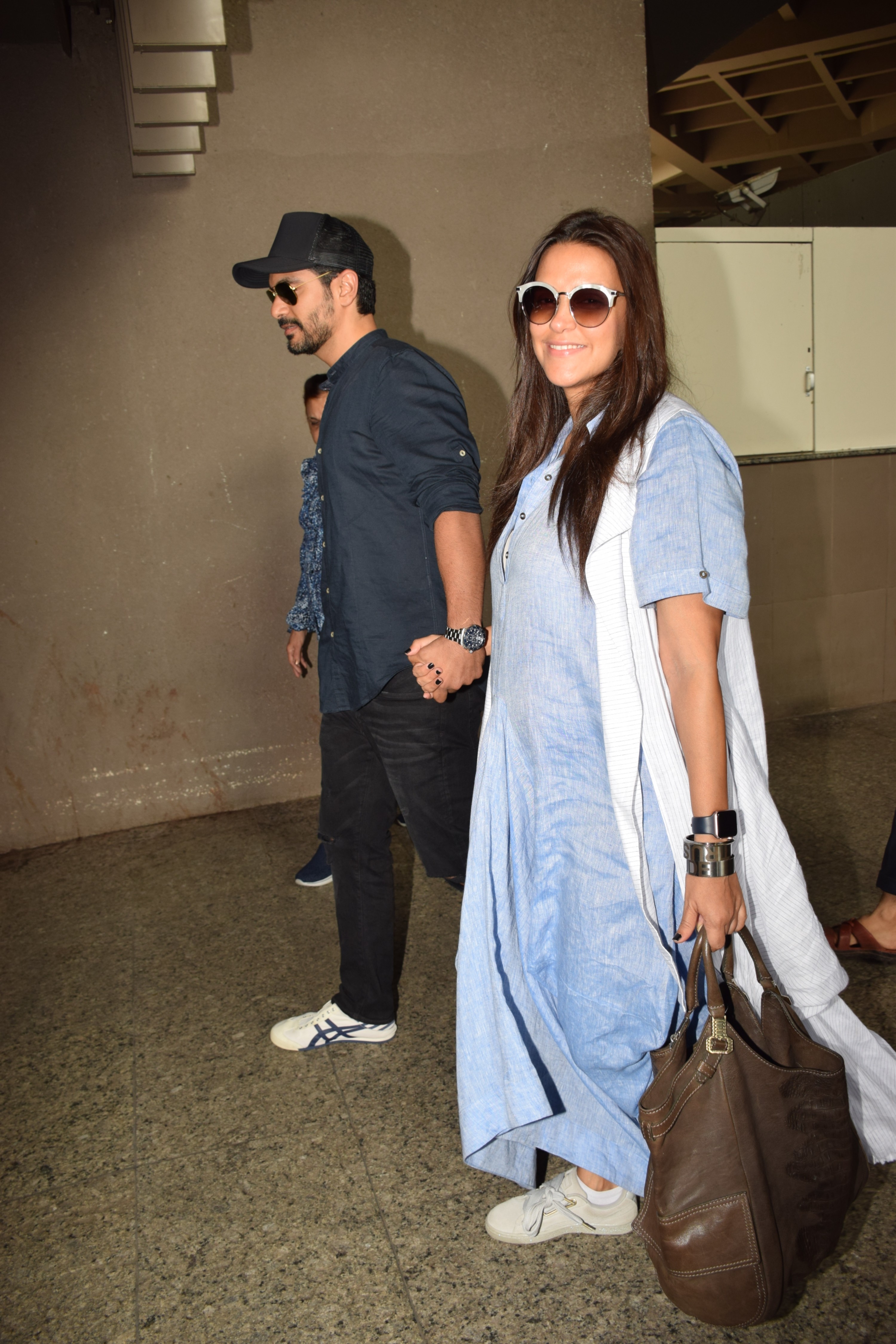 angad neha airport pictures