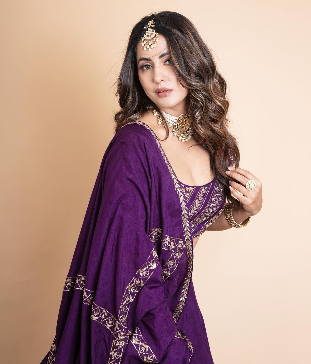 Hina Khan in purple lehenga