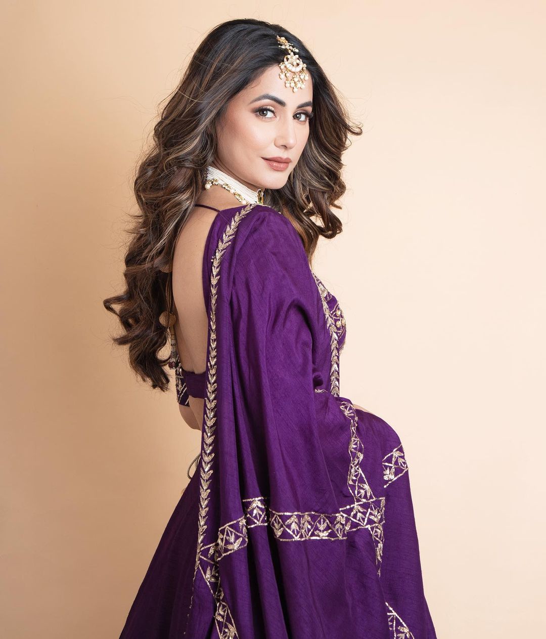 Hina Khan in purple lehenga