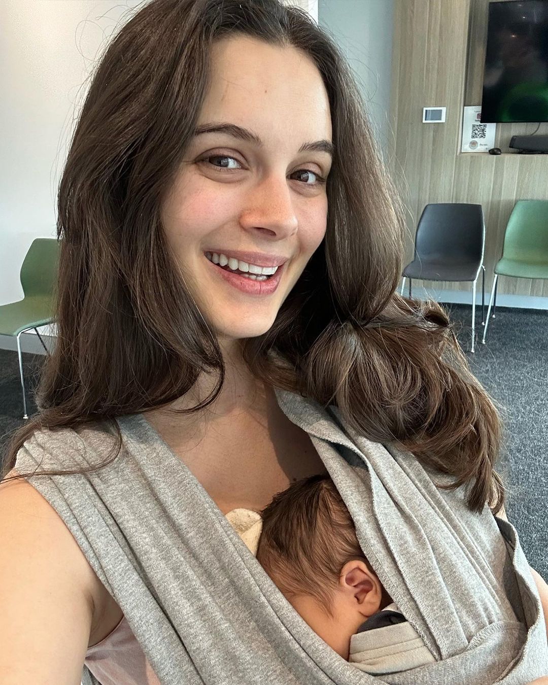 Evelyn-Sharma-holds-her-baby-boy-close-in-adorable-photo