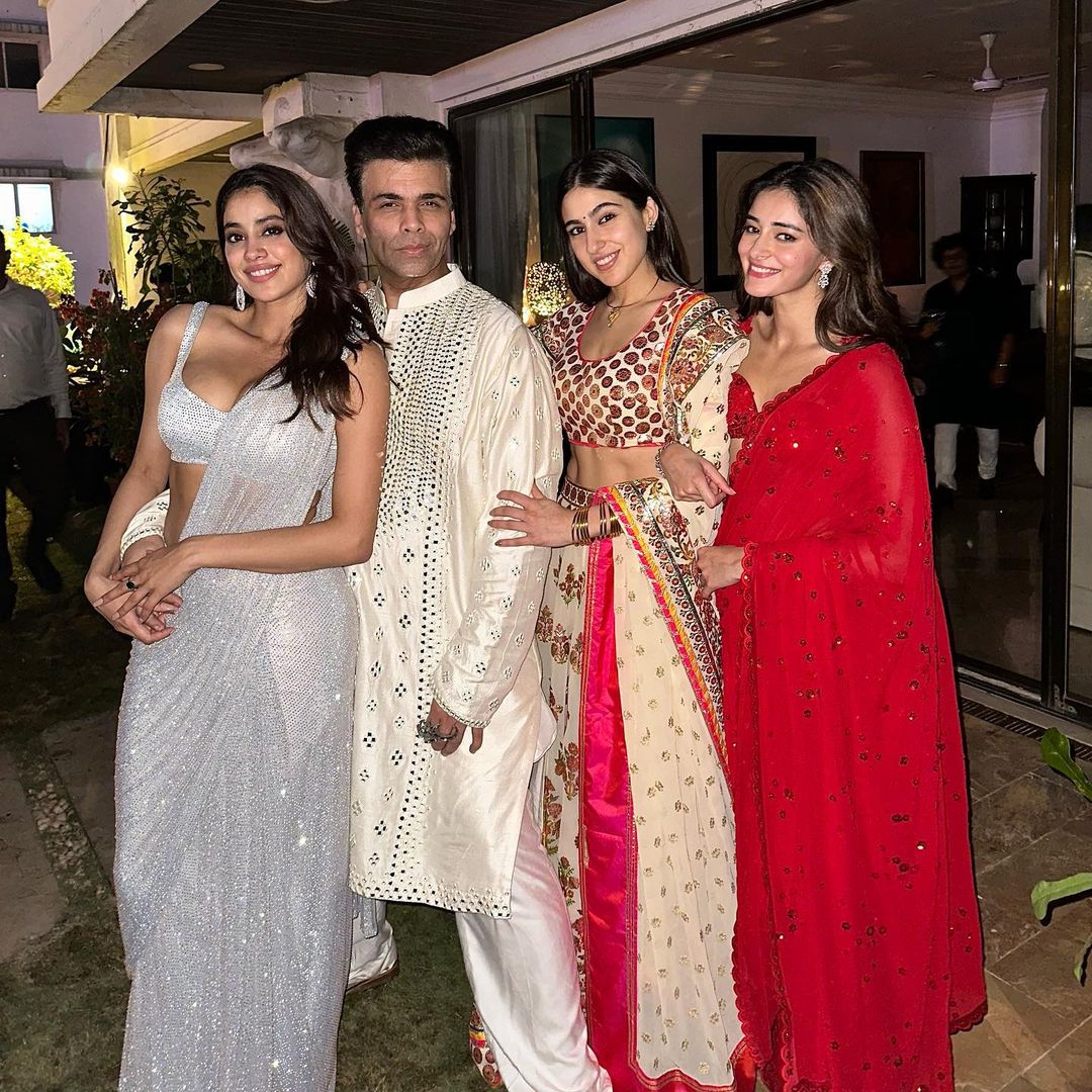 Ananya, Janhvi, and Sara pose with Karan Johar