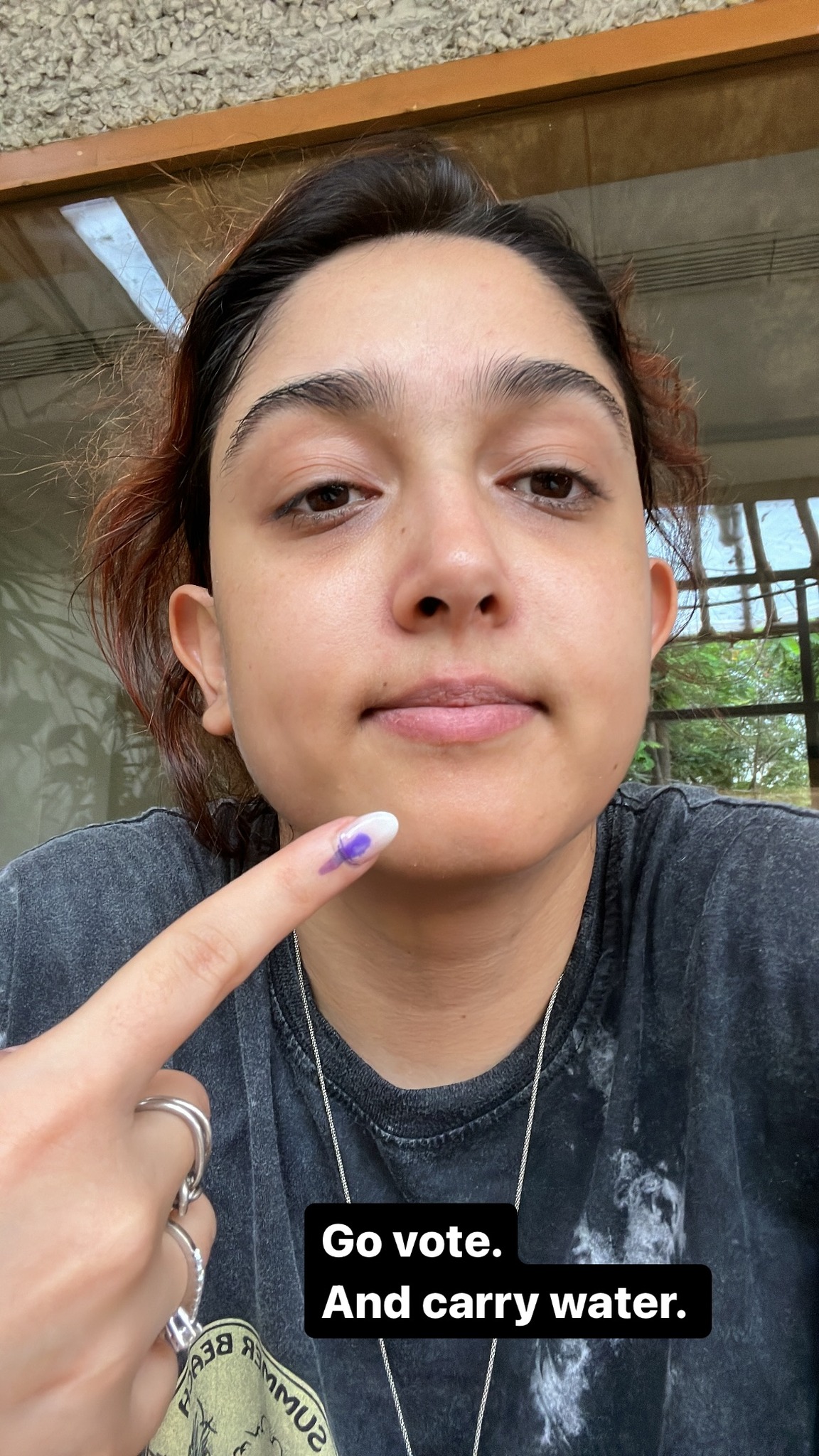 Ira Khan casts a vote and gets inked