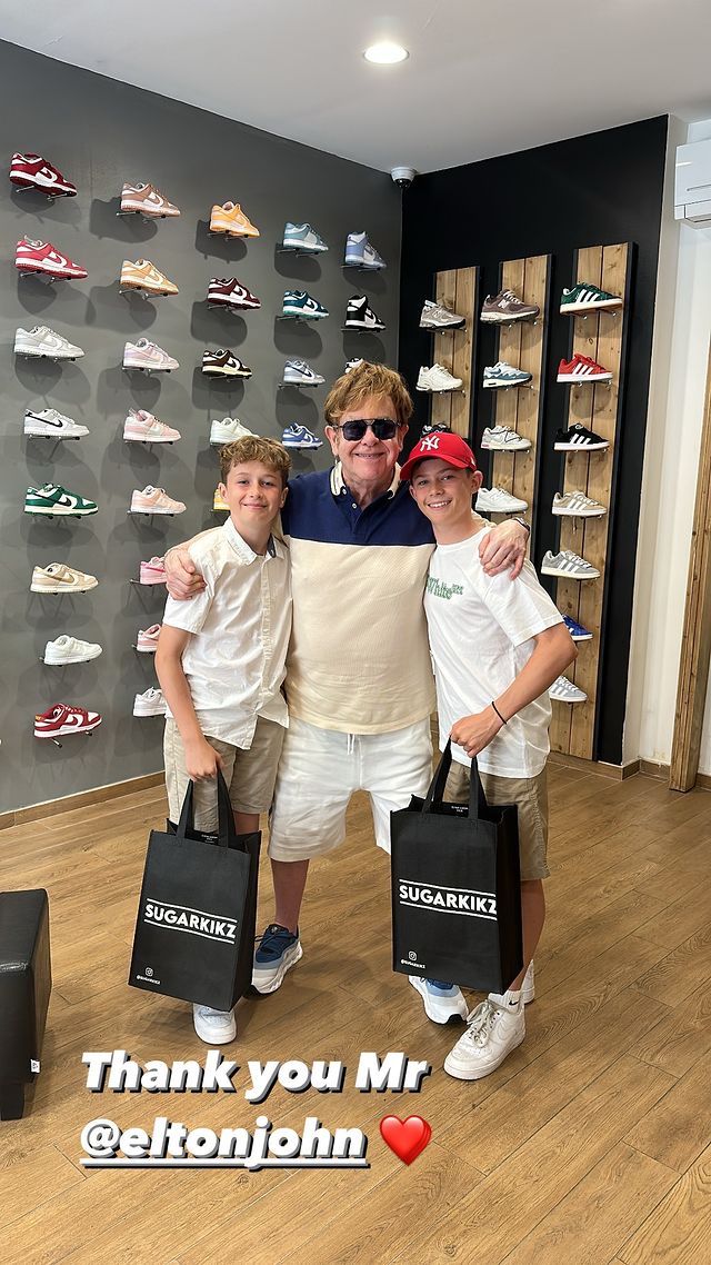Elton John at a sneaker store in France