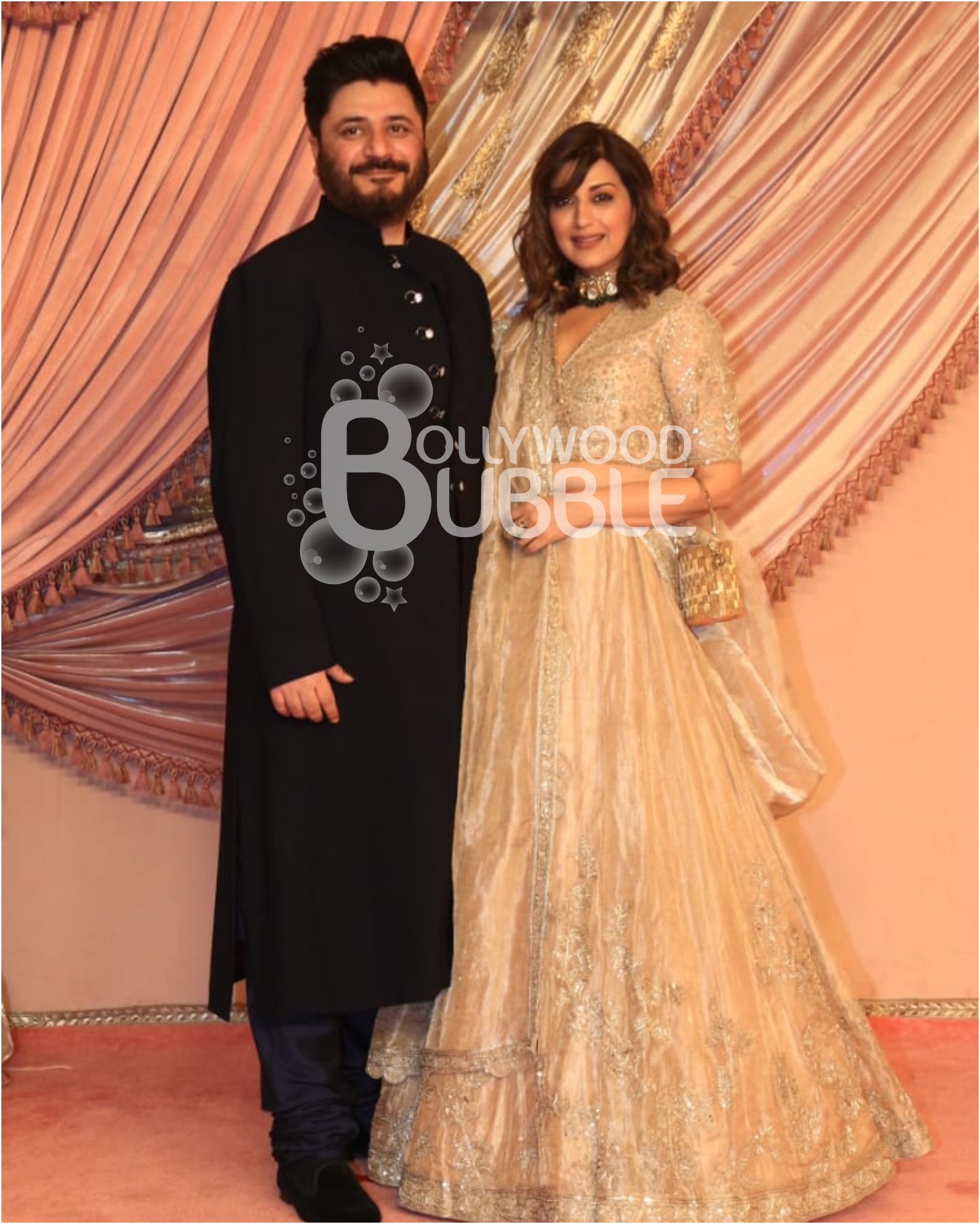 Sonali Bendre with husband at Anant Ambani and Radhika Merchant's Sangeet ceremony